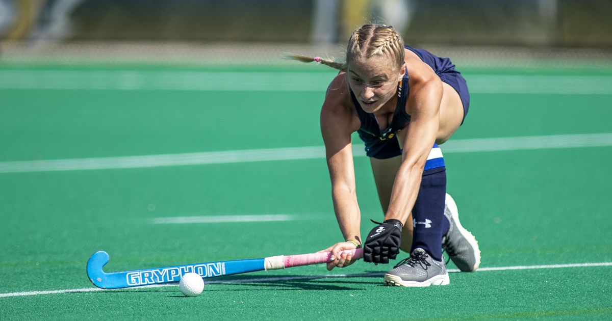 Field Hockey Player Hitting Ball