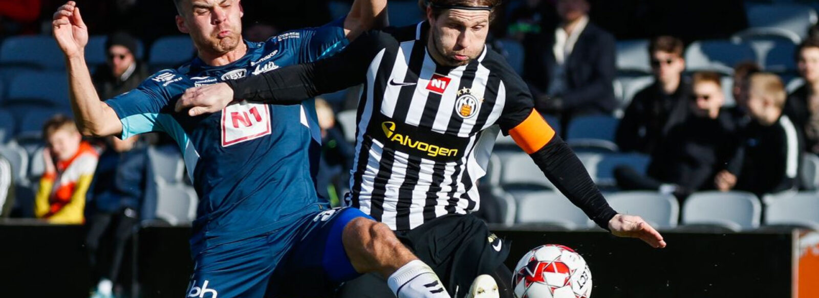 Soccer players in action during a game.